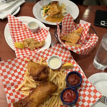 Rockfish Harbor Grill - RockFish and Chips Salmon Filet Fried Calamari Basket of Garlic-Cheese Bread - Seafood Near Me - Monterey, California Rockfish Harbor Grill - RockFish and Chips Salmon Filet Fried Calamari Basket of Garlic-Cheese Bread - Seafood Near Me - Monterey, California