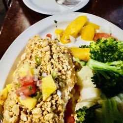 Delicious fresh halibut with nutty crust and mango salsa--delicious!