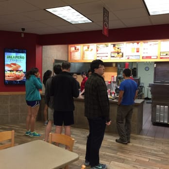 Wendy's - a group of people in a restaurant - Fast Food Near Me - Youngstown, Ohio