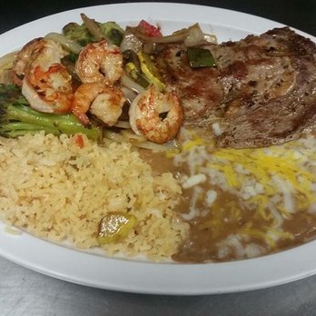Plaza Jalisco - Steak and shrimp plate. Cokes with rice, beans, onions, bell pepper, squash, broccoli, mushroom, grilled onions, and a ribeye steak. - Mexican Near Me - Wadesboro, North Carolina Plaza Jalisco - Steak and shrimp plate. Cokes with rice, beans, onions, bell pepper, squash, broccoli, mushroom, grilled onions, and a ribeye steak. - Mexican Near Me - Wadesboro, North Carolina
