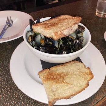 SoBo Kitchen & Bar - Thai Curry Mussels delicious but 50 cents for each extra piece of bread. - American Near Me - Baltimore, Maryland