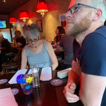Chaise Lounge Restaurant - Mom and hubby contemplating dinner choices - Lounges Near Me - Vancouver, British Columbia
