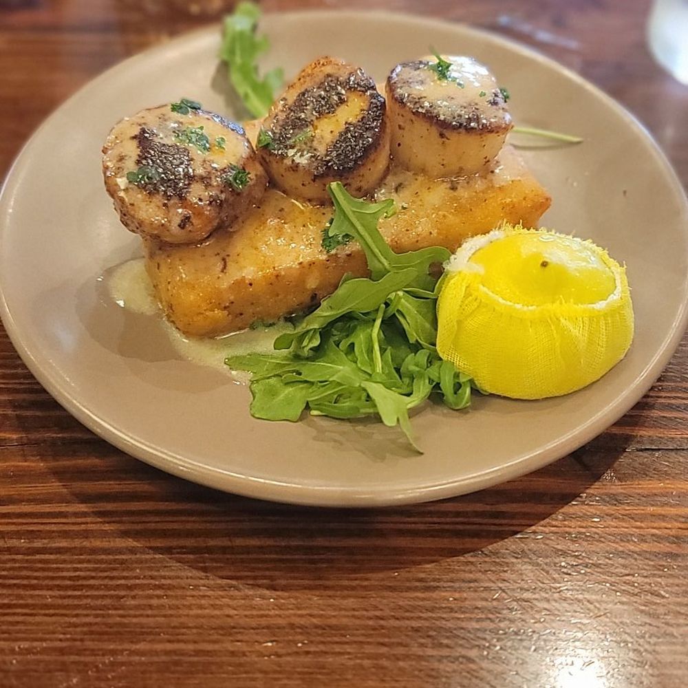 Briquette - Scallops over grits loaf - Seafood Near Me - New Orleans, Louisiana