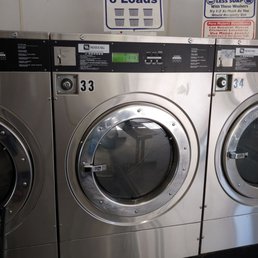 $4.50 for a 6 load wash. $0.25 for a 15 min dry. One complaint is the out of order machines but everythings clean & the place was empty!