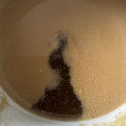 Dunkin' - I tried to take a sip Anyway (we paid and try not to waste) and noticed it was separated, junk floating on the surface of the coffee