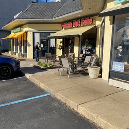 Exterior outside entrance of Perked Up! Coffee Cafe - Tables outside the cafe. - Virginia Beach, Virginia Exterior outside entrance of Perked Up! Coffee Cafe - Tables outside the cafe. - Virginia Beach, Virginia