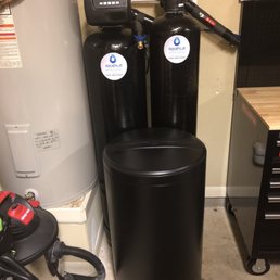 Water softener, carbon filter, and salt brine tank.