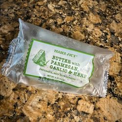 Trader Joe's - I usually make my own but they now have it! Butter with parm, garlic, & herb.