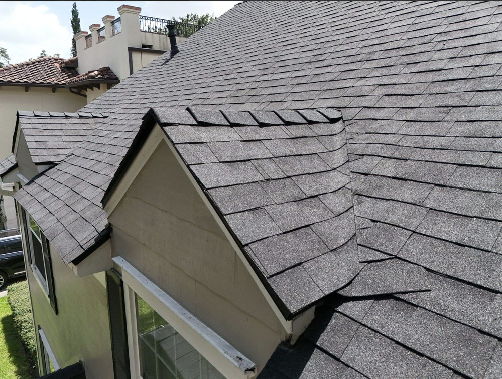 Slide of Noble Roofing