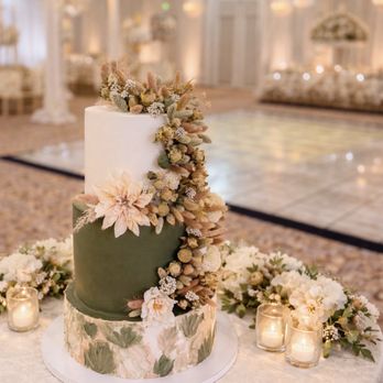 Coco's Treat Bakery - A timeless centerpiece for your wedding day This 3-tier olive green cake, adorned with soft, dried flowers, is pure romance - Cupcakes Near Me - Fresno, California Coco's Treat Bakery - A timeless centerpiece for your wedding day This 3-tier olive green cake, adorned with soft, dried flowers, is pure romance - Cupcakes Near Me - Fresno, California