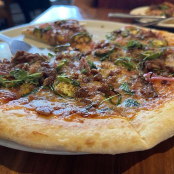 McCoy's Bar & Grill - BBQ Brisket Pizza w/ Jalapeños! - Sushi Bars Near Me - Orlando, Florida McCoy's Bar & Grill - BBQ Brisket Pizza w/ Jalapeños! - Sushi Bars Near Me - Orlando, Florida