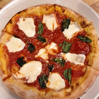Frugatti's - The Margherita Napolitano Pizza is absolutely divine. Seems so simple, yet filled with flavor. - Italian Near Me - Bakersfield, California Frugatti's - The Margherita Napolitano Pizza is absolutely divine. Seems so simple, yet filled with flavor. - Italian Near Me - Bakersfield, California