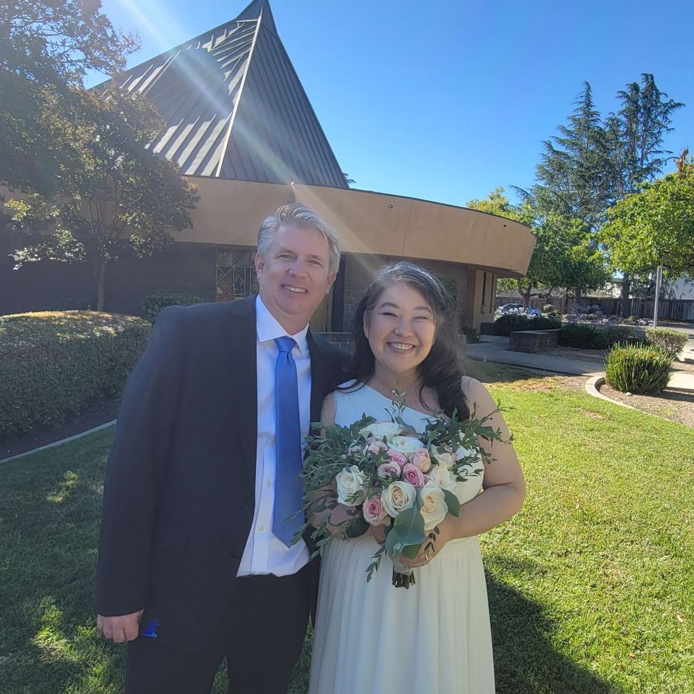 Events By Suzie - The happy couple with her romantic bouquet. - Wedding Planning Near Me - Alameda, California Events By Suzie - The happy couple with her romantic bouquet. - Wedding Planning Near Me - Alameda, California