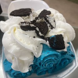 Cookie monster ice cream roll topped with oreos