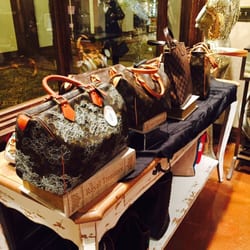 Karma Boutique - Over priced LV bags said to have been used on movie props but too over priced. }:{