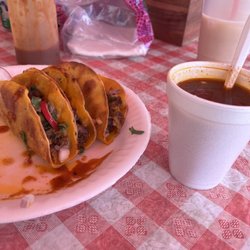 Los Guachos Birrieria - Queso tacos de birria with a cup of consome.
