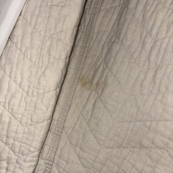 Emerald Valley Inn - stained bedding - Hotels Near Me - Port Angeles, Washington