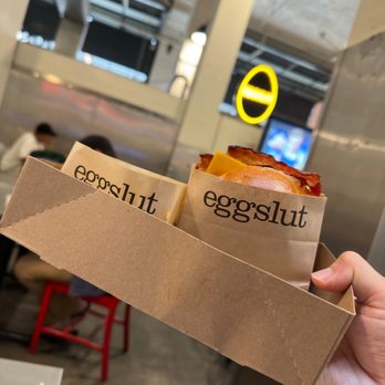Eggslut - Bacon, Egg & Cheese Truffle hashbrowns - Breakfast & Brunch Near Me - Los Angeles, California Eggslut - Bacon, Egg & Cheese Truffle hashbrowns - Breakfast & Brunch Near Me - Los Angeles, California
