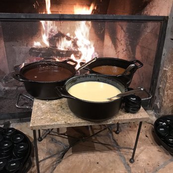 Fireside Dining - Dessert fondue, chocolate, white chocolate and caramel - French Near Me - Park City, Utah Fireside Dining - Dessert fondue, chocolate, white chocolate and caramel - French Near Me - Park City, Utah