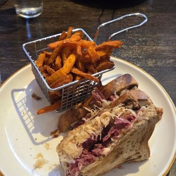Bisbee's Table - Ruben sandwich with sweet potato fries. - American Near Me - Bisbee, Arizona