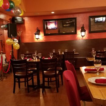 Chulo Restaurant & Bar - Interior with stage - Nepal musid Fri & Sat evenings - Himalayan/Nepalese Near Me - Watertown, Massachusetts