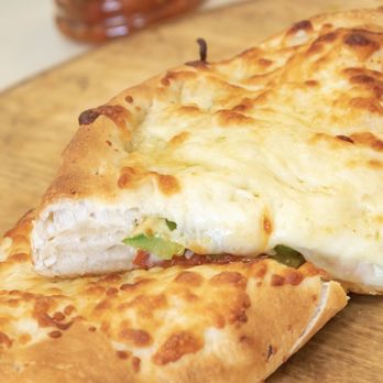 West Broadway Pizza - Calzones automatically come with Ricotta Cheese base, no sauce. - Pizza Near Me - Gardner, Massachusetts West Broadway Pizza - Calzones automatically come with Ricotta Cheese base, no sauce. - Pizza Near Me - Gardner, Massachusetts