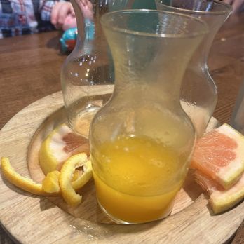 A5 Steakhouse - Orange juice, pineapple juice and grapefruit juice served for our bottles of champagne for mimosas!! - Steakhouses Near Me - Denver, Colorado