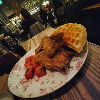 Yardbird - Chicken & Waffles: Honey Hot Sauce, Chilled Spiced Watermelon, Vermont Sharp Cheddar Cheese Waffle, Bourbon Maple Syrup. - Southern Near Me - Las Vegas, Nevada