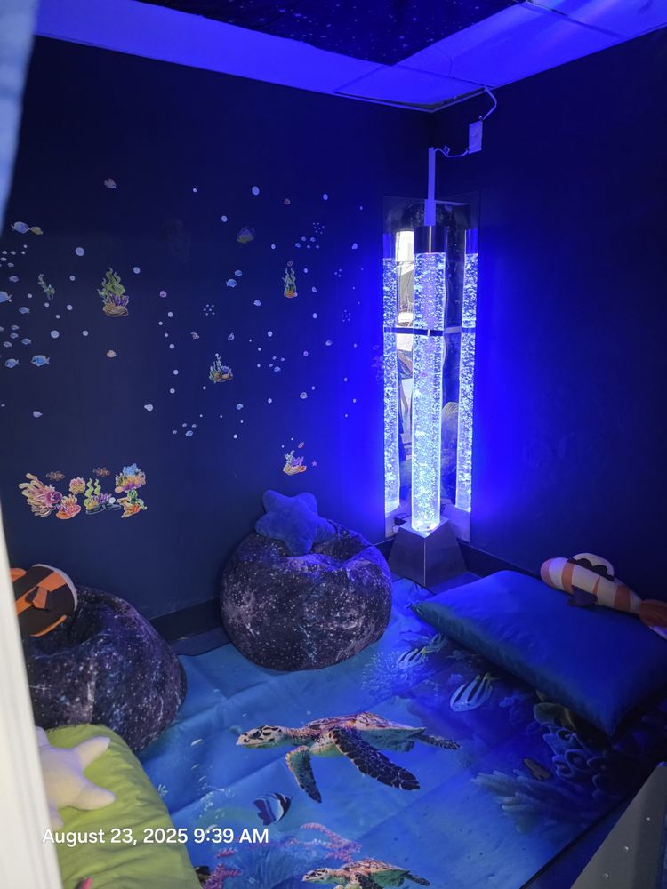 We Rock the Spectrum - Edwardsville Logo