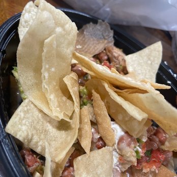 El Pollo Loco - As you can see in the picture out comes a piece of napkin with oil, it came out of the Chips I dumped into my nachos. - Fast Food Near Me - Santa Clarita, California El Pollo Loco - As you can see in the picture out comes a piece of napkin with oil, it came out of the Chips I dumped into my nachos. - Fast Food Near Me - Santa Clarita, California