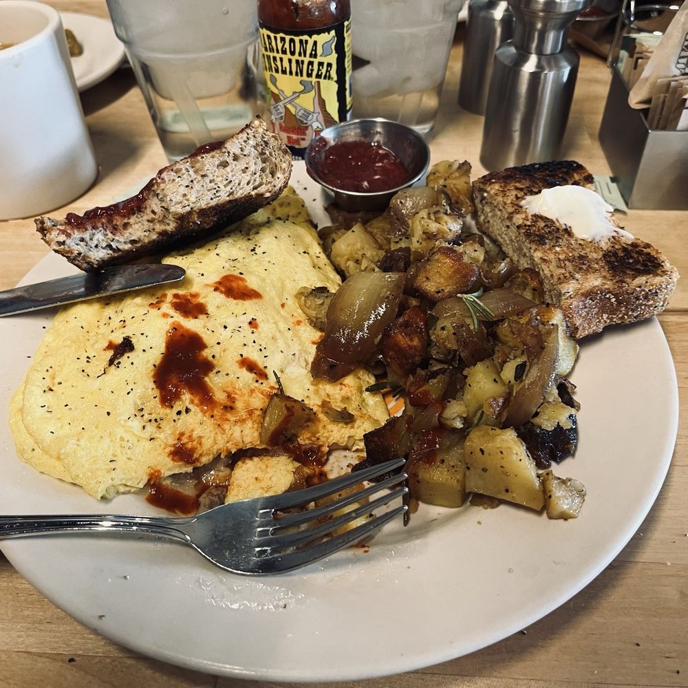 Matt's Big Breakfast Gilbert - Cheese omelet with onions, jalapeños, mushrooms, sausage and Swiss cheese. Wheat toast & homemade strawberry jam. - Breakfast & Brunch Near Me - Gilbert, Arizona