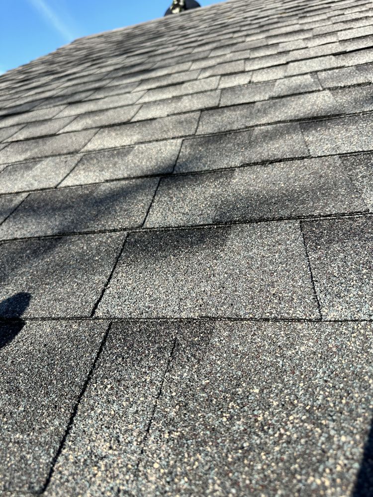 Slide of Taylored Roofing