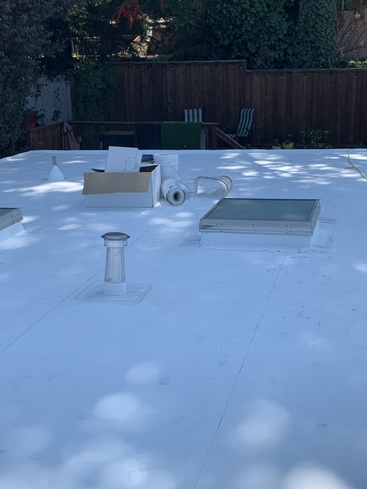 Slide of Ortiz Roofing