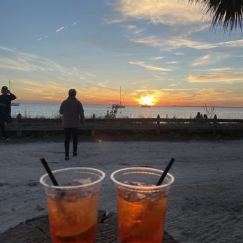 The Cleat Mia - two drinks on a wooden table - Seafood Near Me - Key Biscayne, Florida The Cleat Mia - two drinks on a wooden table - Seafood Near Me - Key Biscayne, Florida