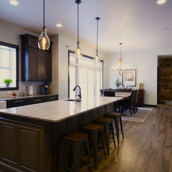 Showcase Floors - a kitchen with a large island - Carpeting Near Me - Fargo, North Dakota Showcase Floors - a kitchen with a large island - Carpeting Near Me - Fargo, North Dakota