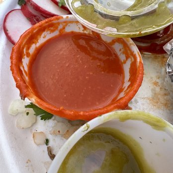 Sanchez Tacos - Santa Fe - a plate of tacos and sauces - Food Trucks Near Me - Santa Fe, New Mexico