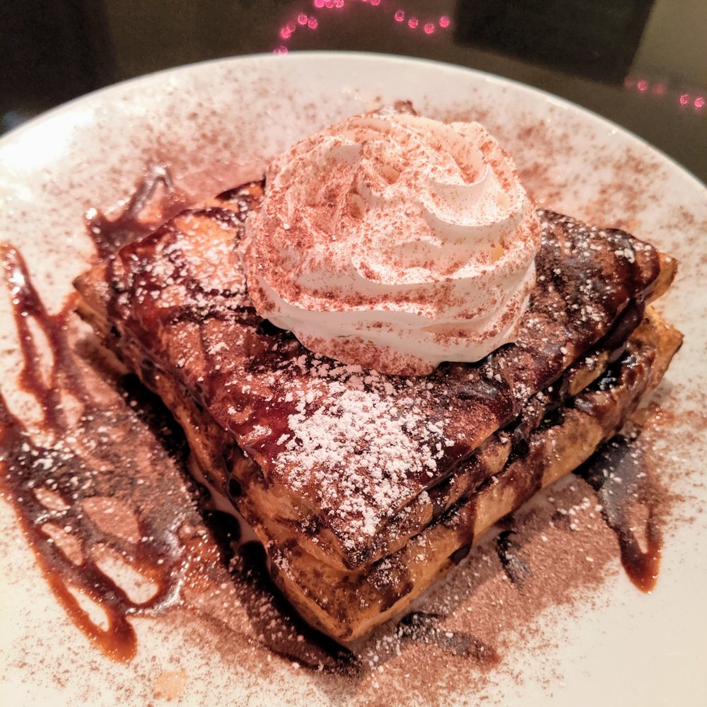 Rustico nutella from their dessert specials: puff pastry filled with vanilla ice cream and strawberries Rustico nutella from their dessert specials: puff pastry filled with vanilla ice cream and strawberries
