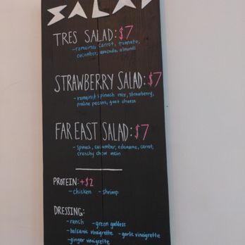 Tres Palmas Açaí - a menu on a wall - Acai Bowls Near Me - Mount Pleasant, South Carolina