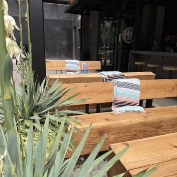 Dos Santos - outdoor tables and throws - Mexican Near Me - Nashville, Tennessee