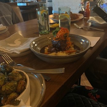 Yardbird - Short rib on top of mash potatoes. In the corner a side of Brussels sprout. - Southern Near Me - Los Angeles, California