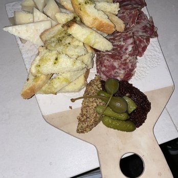 Krasi - Noumboulo Corfu (wild boar) & Cheese - Mediterranean Near Me - Boston, Massachusetts Krasi - Noumboulo Corfu (wild boar) & Cheese - Mediterranean Near Me - Boston, Massachusetts