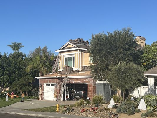 Adan Cruz Roofing Company Logo