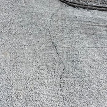 Big D’s Concrete - Cracks throughout the driveway - Masonry/Concrete Near Me