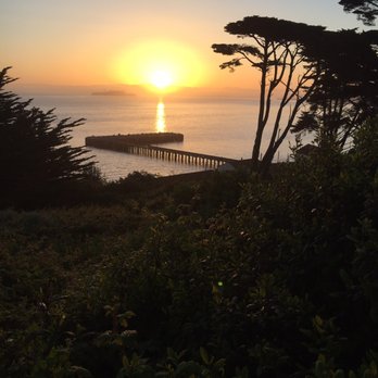 Fort Point - Sunrise viewed from the hill above the fort. - Landmarks & Historical Buildings Near Me - San Francisco, California