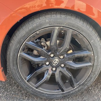 Vj's Tires & Wheels - The white ring around the edge is where the machine ripped the paint off and I had actually asked for my caps back - Tires Near Me - Apache Junction, Arizona