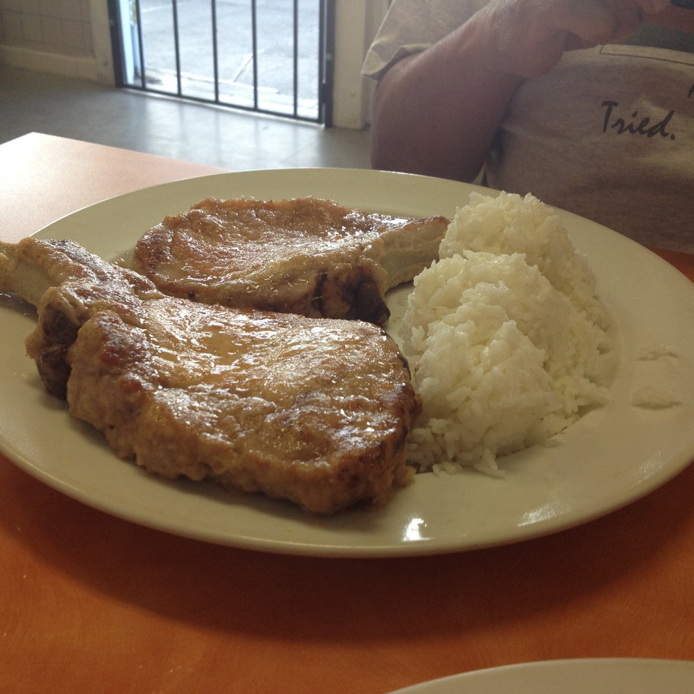Ray's Café - Huge, juicy, and tender rack of pork chops - American Near Me - Honolulu, Hawaii