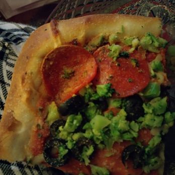 Giuseppe's Pizzeria - a slice of pizza on a plate - Pizza Near Me - Watervliet, New York