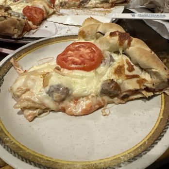Village Pizza & Pub - Sausage, onion, garlic, fresh tomatoes on a double decker - Pizza Near Me - Elgin, Illinois