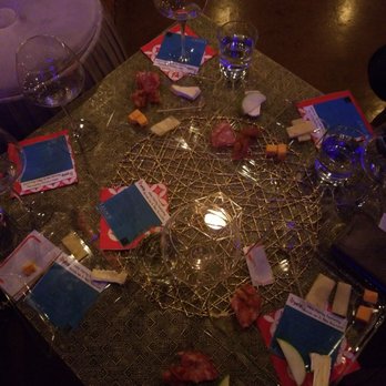 Xe 54 - a table with wine, cheese and crackers - Wine Bars Near Me - Neenah, Wisconsin Xe 54 - a table with wine, cheese and crackers - Wine Bars Near Me - Neenah, Wisconsin
