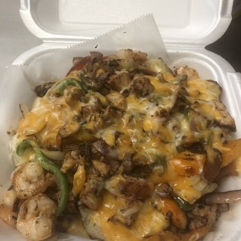 Auto Mile Inn - Shrimp & chicken stuffed potato,prepared by Angry Al - American Near Me - Bedford, Ohio